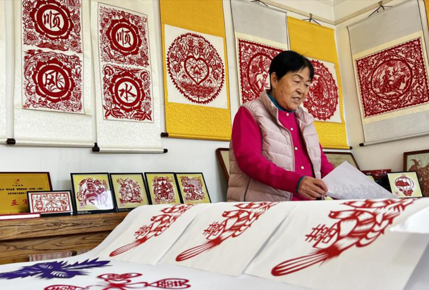 Flowers from Fingertips: The Millennium Heritage and Creative Beauty of Chinese Paper Cutting